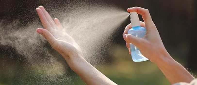 close-up-woman-hands-applying-alcohol-spray-anti-bacteria-spray-Top close-up-woman-hands-applying-alcohol-spray-anti-bacteria-spray-Top