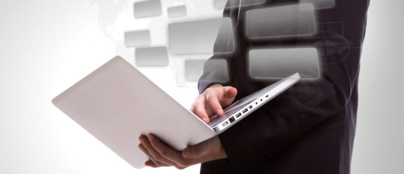 man-with-laptop-gray-squares man-with-laptop-gray-squares